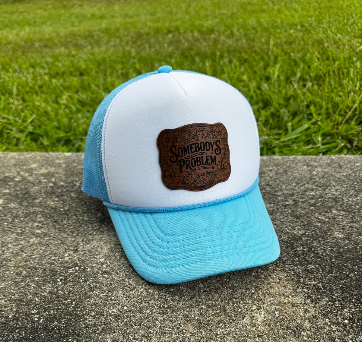 Somebody’s Problem Leather Patch Foam Trucker Hat
