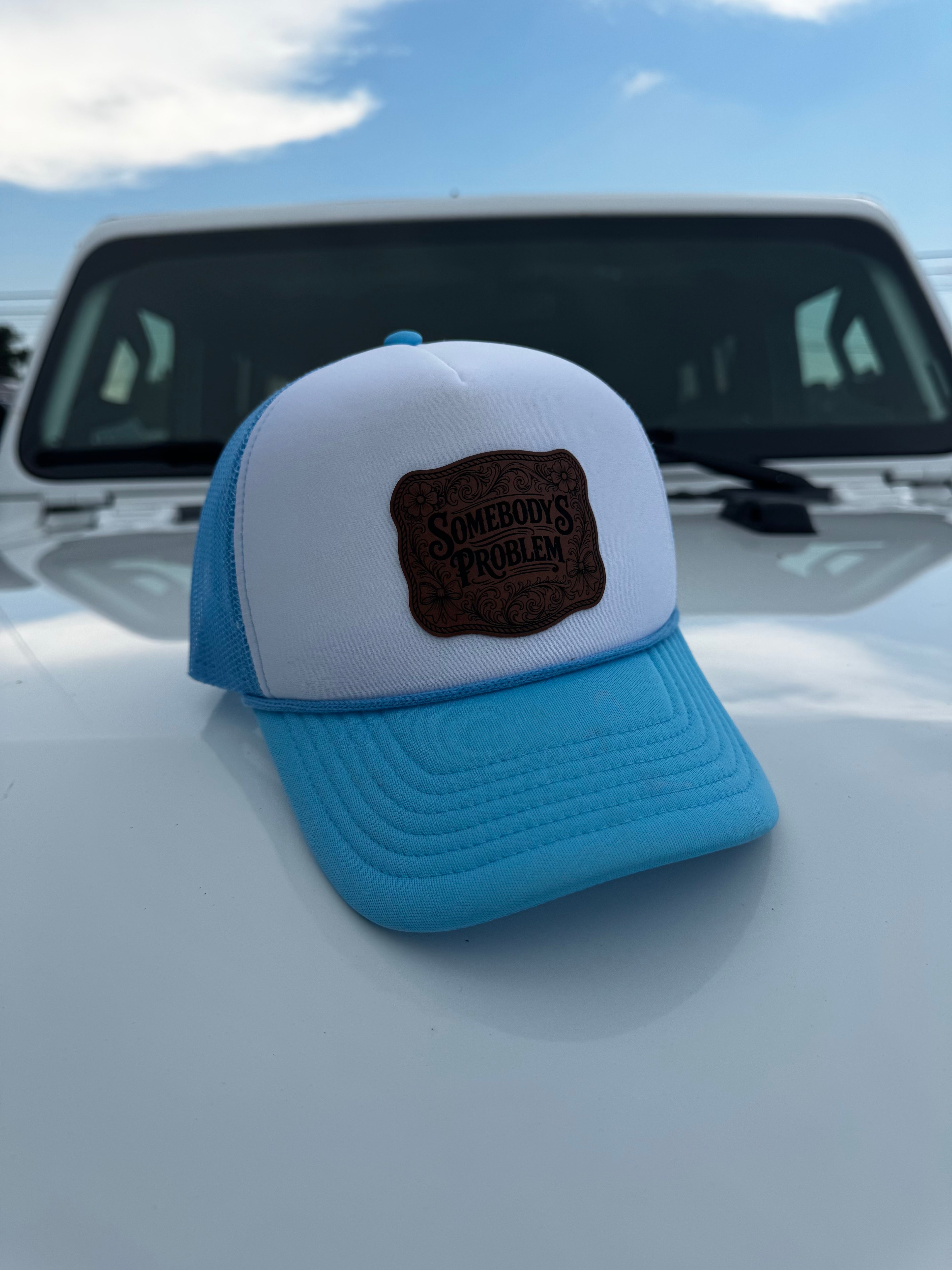 Somebody’s Problem Leather Patch Foam Trucker Hat